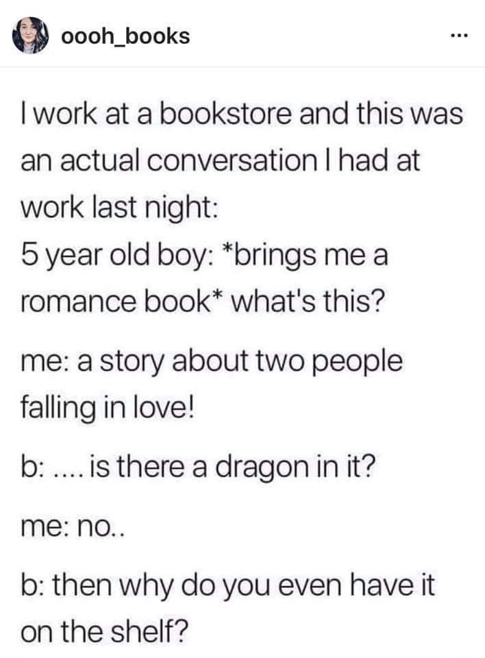 Young Boy In The Library With An Insightful Question